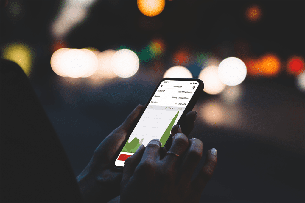 A woman on a dark busy road uses the IPVanish VPN safe and secure connections